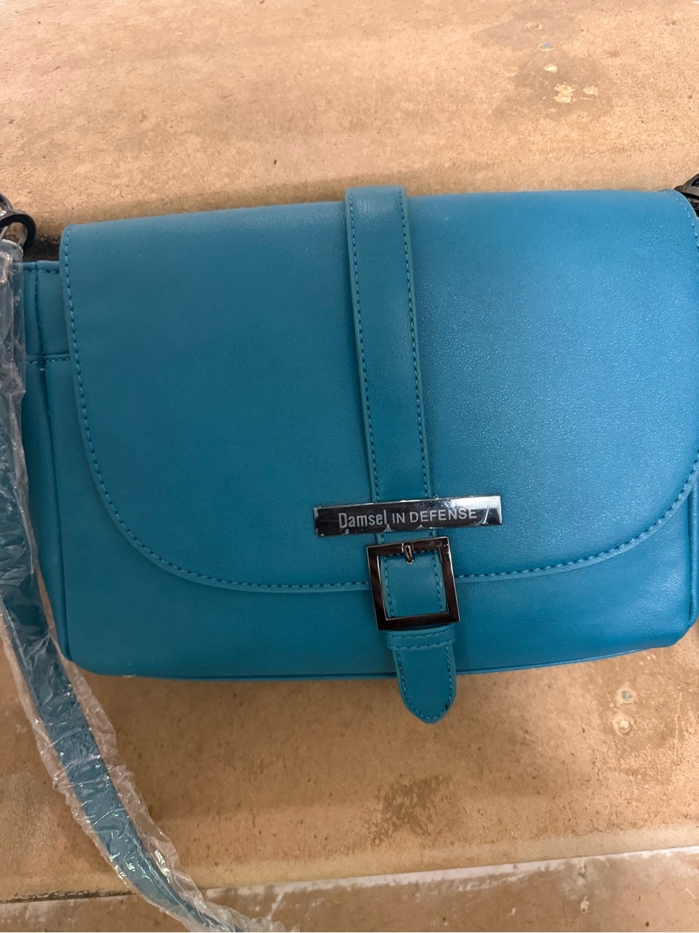 Damsel in Defense Teal Shoulder Crossbody Bag